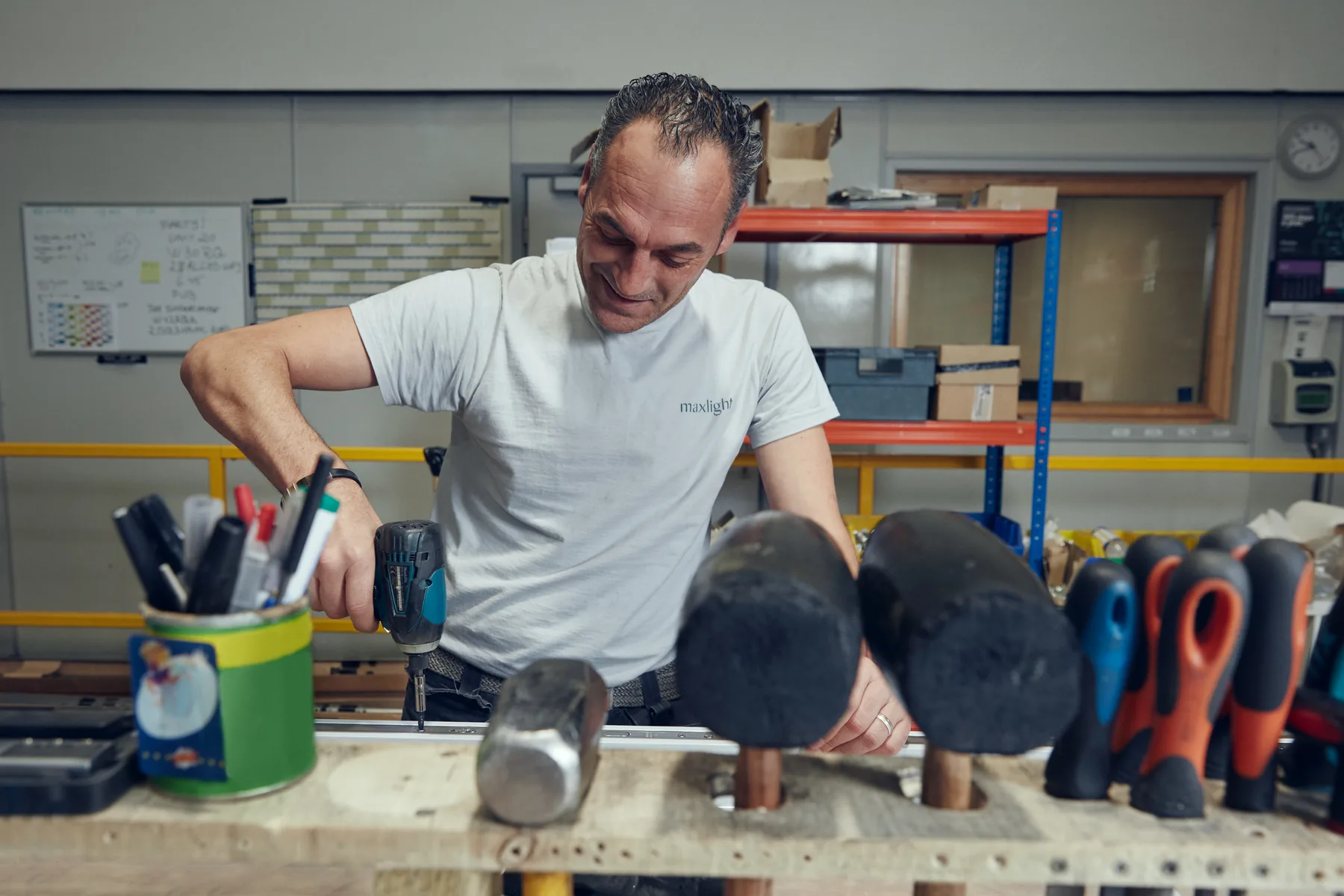 Maxlight technician manufacturing an aluminium glazing system in the London facility