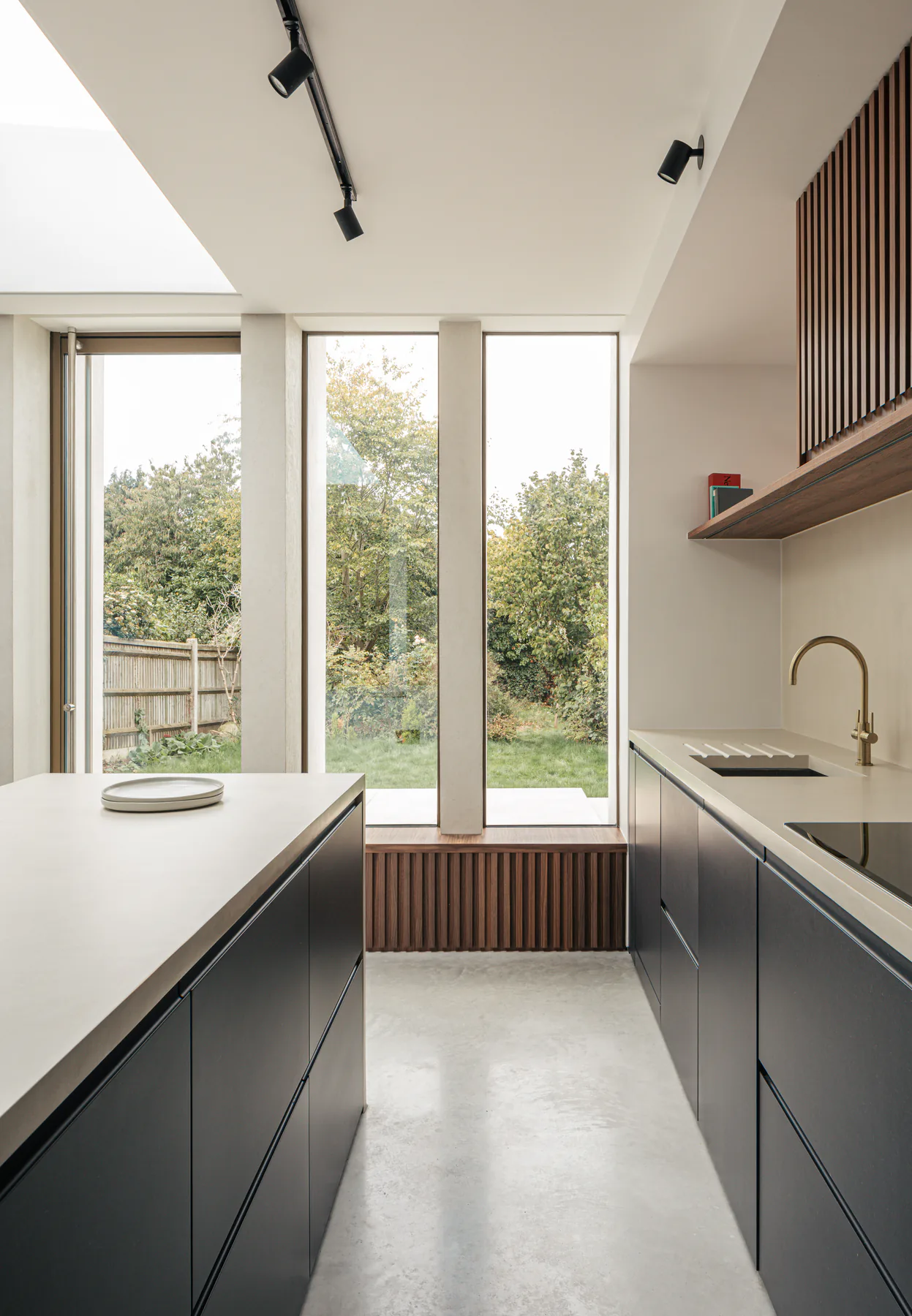 Tall fixed kitchen windows overlooking open countryside